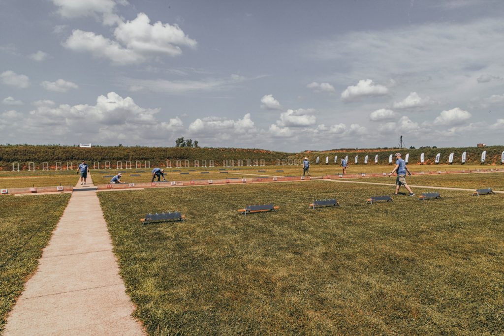 Our team resets and repaints the targets between rounds